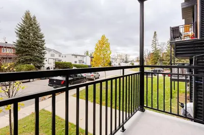 a balcony with a view of a street at Voltaire 2 Appartement 4,5 , 2ch Laval, Canada meublé in Laval