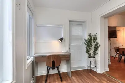 a home office with a desk and a chair at Fox Aparthotel Palais Des Congres V in Montréal