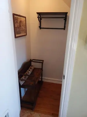 a hallway with a wooden table in a room at Cozy 2 bedroom close to downtown in Montréal