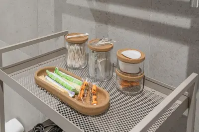 a table with a tray of vegetables and jars on it at Bright & Modern 2BR - Golden Square Mile in Montréal