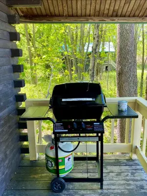 a grill sitting on a table on a patio at chalet 4 - Domaine de l'Archipel in Sorel