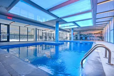 a large indoor swimming pool in a building at Montreal - C Lofts Le Smith - 2B1B 1006 in Montréal