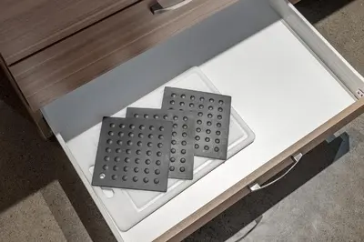 a white coffee table with two metal objects on it at Historic Old Montreal Stay - Iconic Location in Montréal