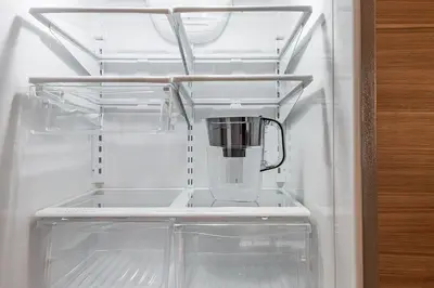 an empty refrigerator with a blender in it at Chic Old Montreal Retreat - Iconic Location in Montréal