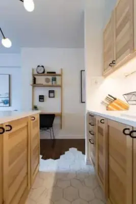a kitchen with a mess on the floor at The Sherbrooke Suite 102 in Montréal