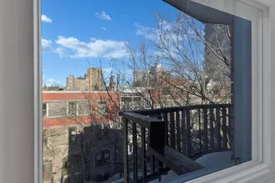 a view of a city from a balcony at The Speakeasy Suite 501 With Parking in Montréal