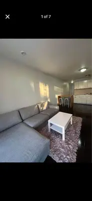 a living room with a couch and a coffee table at Mont roamyal in Montréal
