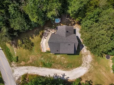 an aerial view of a house in the woods at Chalet La Dinette in Stanbridge Station