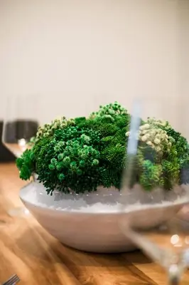 a bowl of broccoli sitting on a wooden table at Lynx spa detente Orford in Magog-Orford