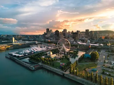 an aerial view of a city with a ferris wheel at Beautiful Spacious Apartments! 6 guest Vacation home Montreal in Montréal