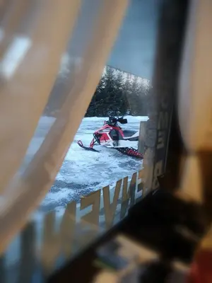 an aerial view of a snowmobile in the snow at Motel Alexandrin in Saint-Georges