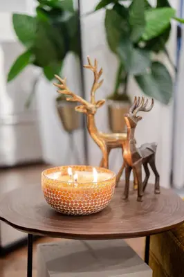 a table with a candle and a bowl on it at Stylish Retreat Near Crescent & Sainte-Catherine in Montréal