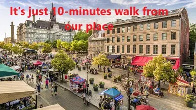 an overhead view of a city street with people walking at Downtown Montreal Lofts Quartier des Spectacles in Montréal