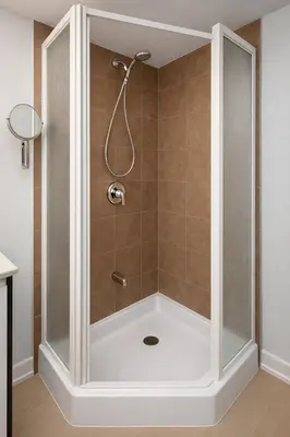 a shower with a glass door in a bathroom at Fonctionnal Escape in Trendy Plateau Montreal in Montréal