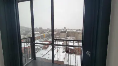 a view of a city from a window at chambre au centre ville de Montréal in Montréal