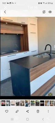 a kitchen with a sink and a counter top at Very large room in Montréal