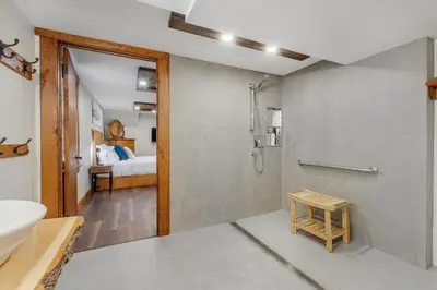 a bathroom with a shower and a sink at auxportesdesMilleIles in Laval