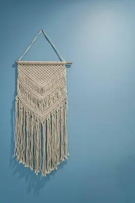 a brown rug hanging on a blue wall at 117 - Spacious 2 King BD with Parking, Near DT & Airport in Montréal