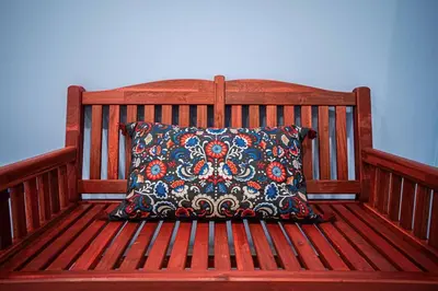 a wooden bench with a pillow on it at 117 - Spacious 2 King BD with Parking, Near DT & Airport in Montréal