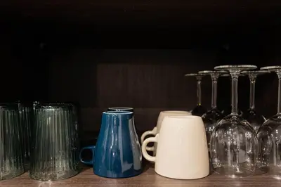 a group of glasses sitting on top of a table at 209 - Modern Home Ambiance 2 BR with Gym,Parking,DT&Airport in Montréal