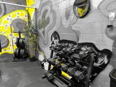 a gym with a wall with a painting on it at 217 - Pastel Stylist 2 KING-BR with Parking, nr DT&Airport in Montréal
