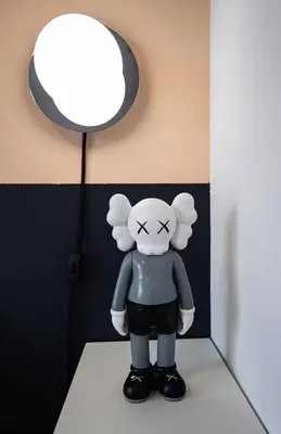 a toy animal is sitting on a table next to a lamp at 219 - Abstract Designer King Suite with Parking, DT&Airport in Montréal