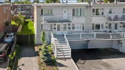 an aerial view of a large house with a driveway at The Samson Haven in Laval