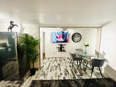 a dining room with a table and chairs at Linda inn - Entire Unit- Sleep 3- Sherbrooke in Sherbrooke