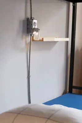 a shower in the corner of a room at Auberge Le Treehouse in Montréal