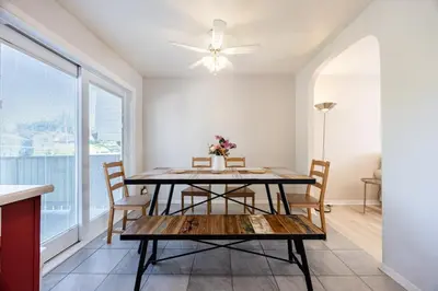a dining room with a table and chairs at Quiet 4 BR House , 20 min to DT, Free Parking in Brossard
