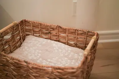 a wicker basket sitting on the floor in a room at Autumn Fairy Tale, Comfy Entire House with parking in Brossard