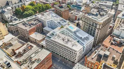 an overhead view of a city with tall buildings at Old Montreal Suite with Rooftop Pool & Terrace in Montréal