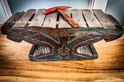 a wooden table with a baseball bat on top of it at Villa Nao in Roxton Falls