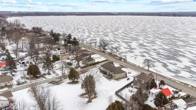 an aerial view of a town next to a large body of water at A Getaway on Lake Champlain in Venise-en-Québec