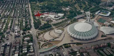 an aerial view of a large building with a stadium at L'Adresse Botanique - Studio in Montréal