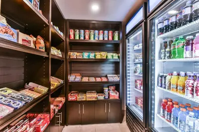 a refrigerator filled with lots of food and drinks at Comfort Inn Montreal Aeroport in Pointe-Claire