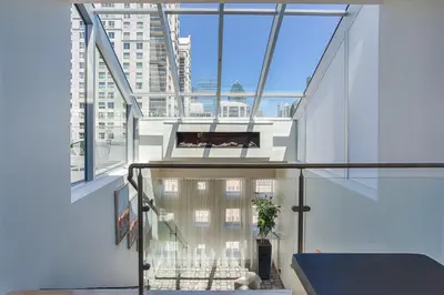 a view from the top of a building with tall windows at Le Mount Stephen in Montréal