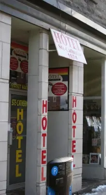 a store with a sign on the front of it at Hotel Ste-Catherine in Montréal