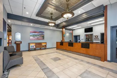 a lobby of a hospital with a waiting room at Quality Suites in Drummondville