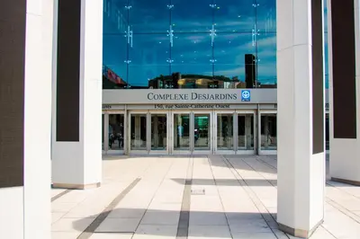 a building with a sign that reads compare dissidents at Hotel Casa Bella in Montréal