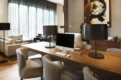 a room with a desk with a computer on it at Hôtel AC Montréal Centre-ville in Montréal