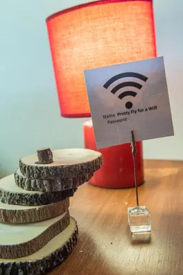 a sign sitting on top of a stack of coins at Gite du Survenant Montreal in Montréal