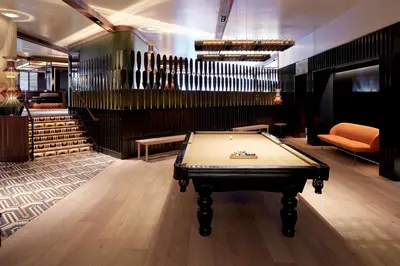 a pool table in a room with a ping pong ball at DoubleTree By Hilton Montreal in Montréal