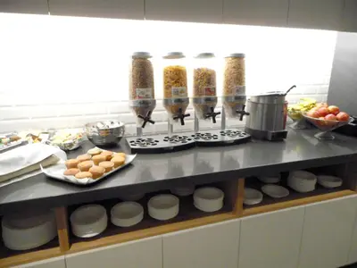 a kitchen with a counter with food on it at Le Dauphin Montréal Centre-Ville in Montréal