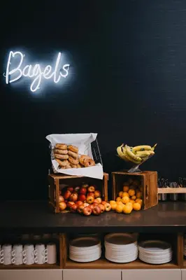 a display of fruits and vegetables on a counter at Le Dauphin Montréal Centre-Ville in Montréal