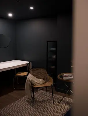 a room with a desk and a chair and a table at Maison Saint-Vincent By Maisons & co in Montréal