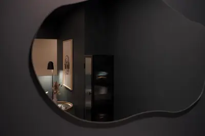 a bathroom with a sink and a mirror at Maison Saint-Vincent By Maisons & co in Montréal