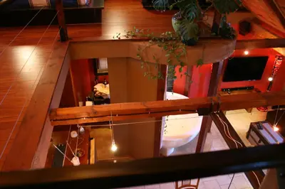 an overhead view of a living room with a table at Manoir Ramezay in Marieville