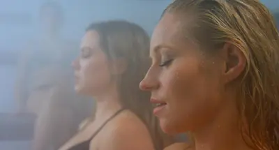 two women standing next to each other at Kinipi Spa Nordique & Hebergement in Trois-Rivières