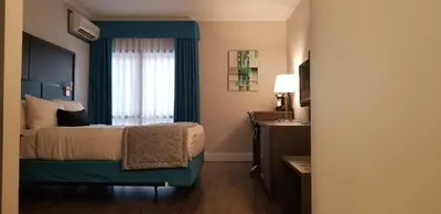 a hotel room with a bed and a window at Best Western Laval-Montreal & Conference Centre in Laval